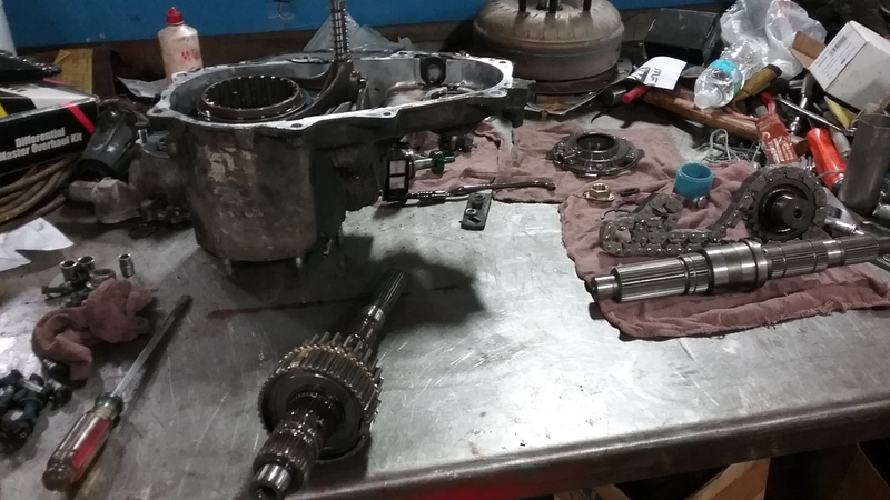 Exploded view transfer case. It actually looked pretty darn nice in there, considering I don’t think it’s been off the jeep in 26 years. Had to play hydraulic press games to get all the bearing squared away, but it eventually fell in line.